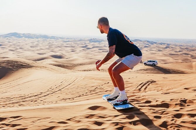 4 Hour Morning Desert Safari with Camel Ride & Sand Boarding - Sandboarding and the desert photo stop