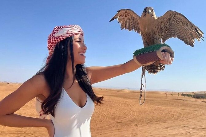 4 Hours Desert Tour with Quad Bike Camel Ride & Sandboard - A 15-minute camel ride gives you the traditional touch