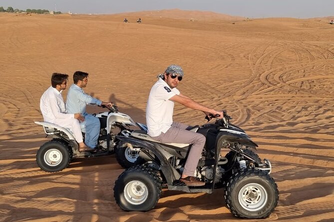 4 Hours Desert Tour with Quad Bike Camel Ride & Sandboard - Thirty minutes of dune bashing in a 4x4