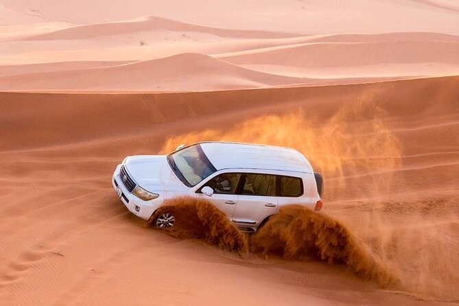 4hr Desert Safari: Sunset,Sunrise,Camel,Sand boarding,Inland Sea - From Doha to Sealine, where the tires come off