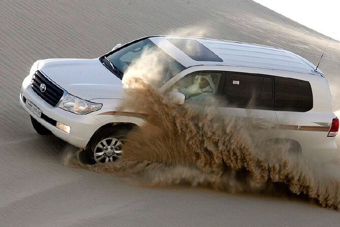 4hr Desert Safari: Sunset,Sunrise,Camel,Sand boarding,Inland Sea - The Inland Sea, with Saudi Arabia across the water