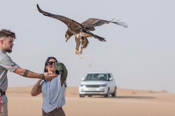 4hr Desert Safari: Sunset,Sunrise,Camel,Sand boarding,Inland Sea - Sandboarding from the highest dunes