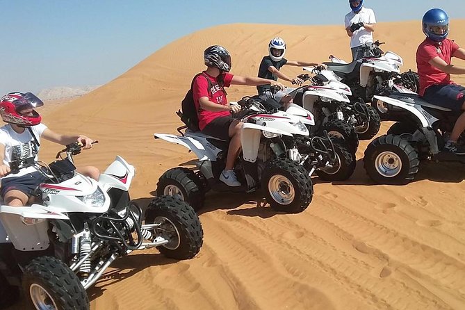 6-Hour Dubai Desert Safari with BBQ Dinner & Quad Biking - Tanoura, belly dance, fire show, and live music