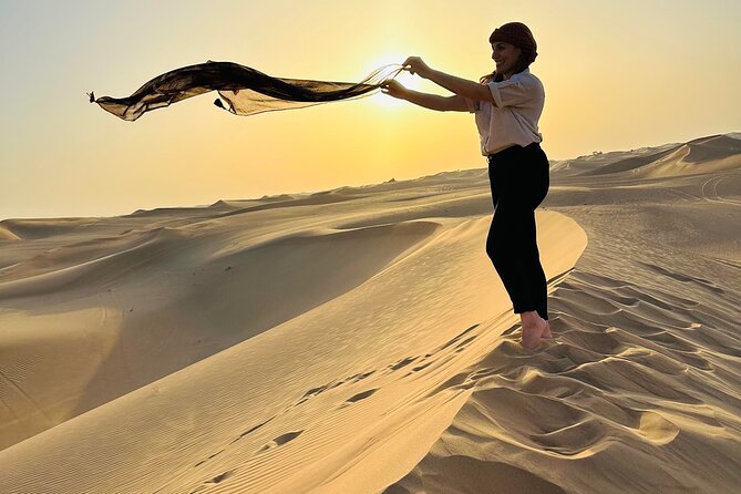 Abu Dhabi: 4x4 Desert Safari and Sandboarding. - Sandboarding and traditional camp activities