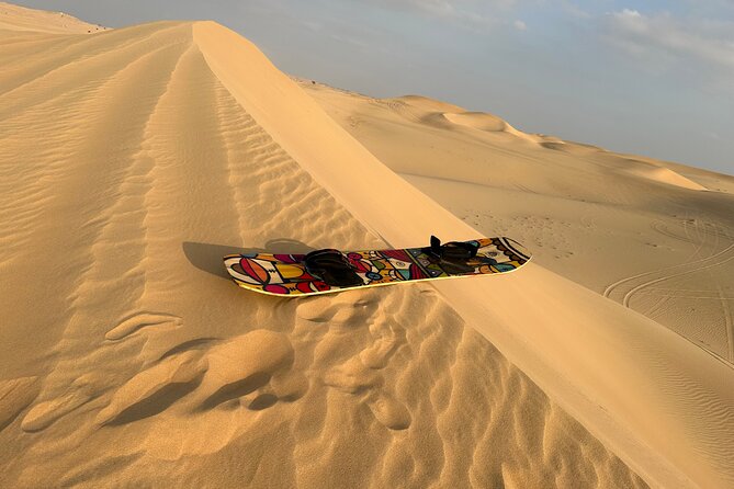 Abu Dhabi: 4x4 Desert Safari and Sandboarding. - BBQ dinner, entertainment, and sunset