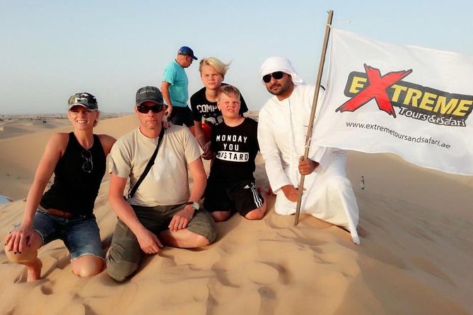 Abu Dhabi: 7-Hours Desert Safari with BBQ, Camel Ride & Sandboarding - From Abu Dhabi to the Al Khaznah desert