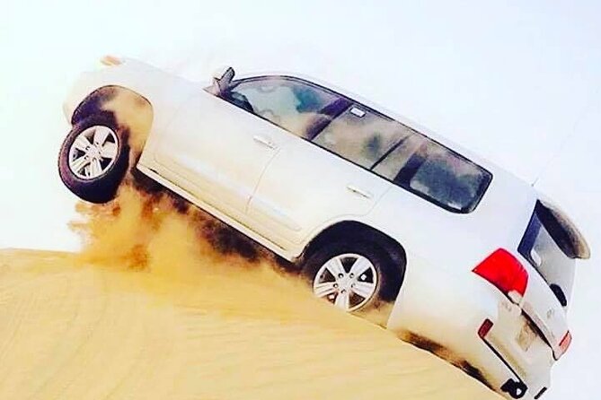 Abu Dhabi: 7-Hours Desert Safari with BBQ, Camel Ride & Sandboarding - BBQ dinner and evening entertainment
