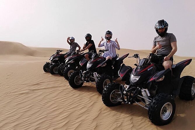 Abu Dhabi Desert Safari BBQ Dinner Live Shows Pick & Drop More - Belly dance, Tanura, and fire performances