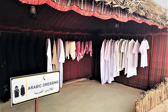 Abu Dhabi Desert Safari (Dune Bashing, BBQ Dinner, Camel Ride & Sand Skii) - Sandboarding on the Abu Dhabi dunes