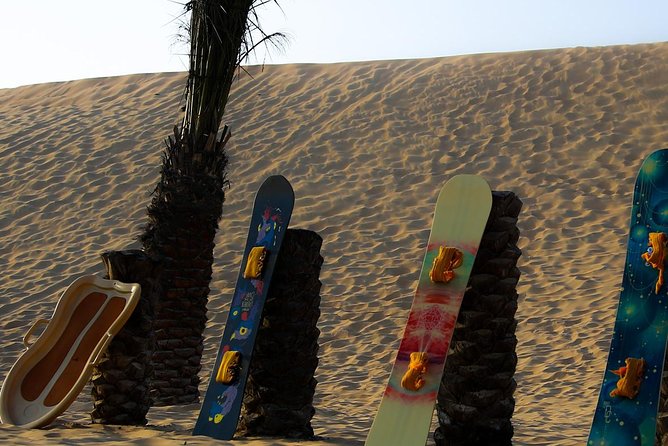 Abu Dhabi Desert Safari (Dune Bashing, BBQ Dinner, Camel Ride & Sand Skii) - Belly dance, Tanoura, and stargazing
