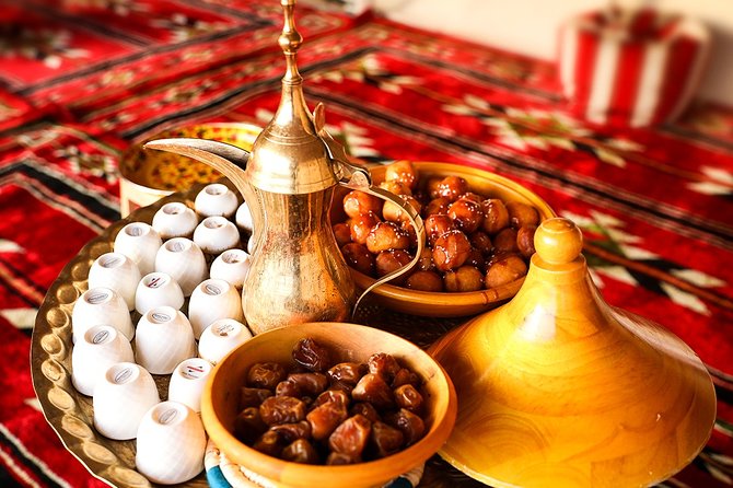 Abu Dhabi: Desert Safari with BBQ, Camel Ride & Sandboarding - Camel farm stop before the main ride
