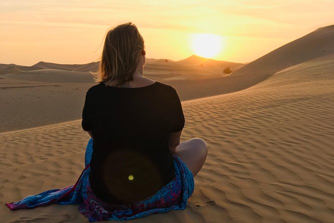 Abu Dhabi Desert safari with BBQ Dinner,Sandboarding & Camel ride - Dune bashing across Abu Dhabi’s sand