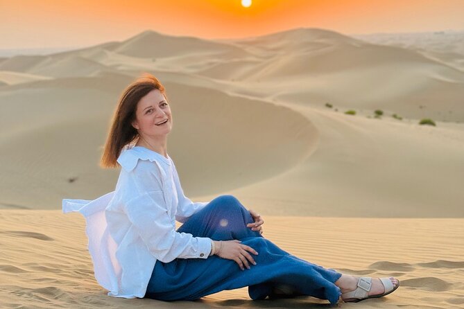 Abu Dhabi Desert Safari with Live Entertainment and Live BBQ - Sunset views and a slower desert pause