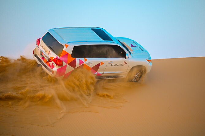 Abu Dhabi Evening Desert Safari - Private car Dune bashing & BBQ - A remote camp with dinner under the night sky
