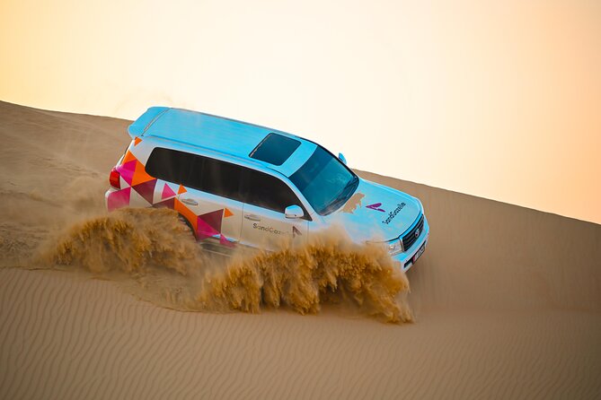 Abu Dhabi Evening Desert Safari - Private car Dune bashing & BBQ - Dune bashing and sandboarding in a prepared 4x4
