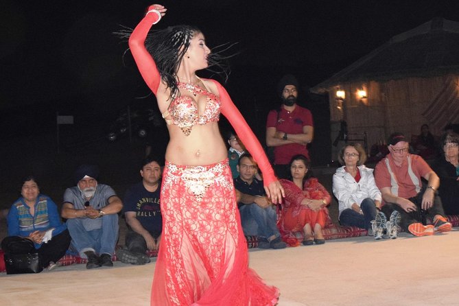 Abu Dhabi Evening Desert Safari with BBQ Dinner and all Camp Activities - Sandboarding gives you a quieter desert thrill