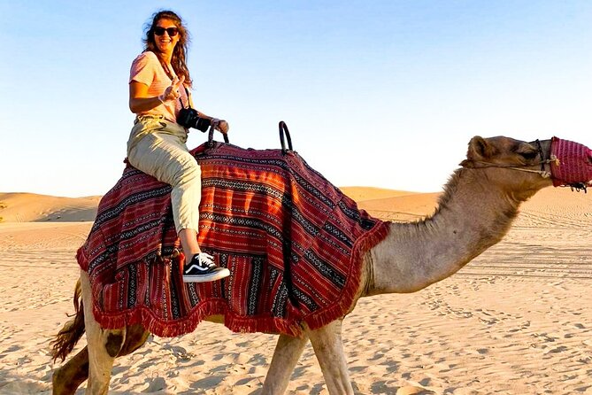 Abu Dhabi: Evening Desert Safari with Camel Ride, BBQ & Live Show - Sunset from the dunes and camp activities