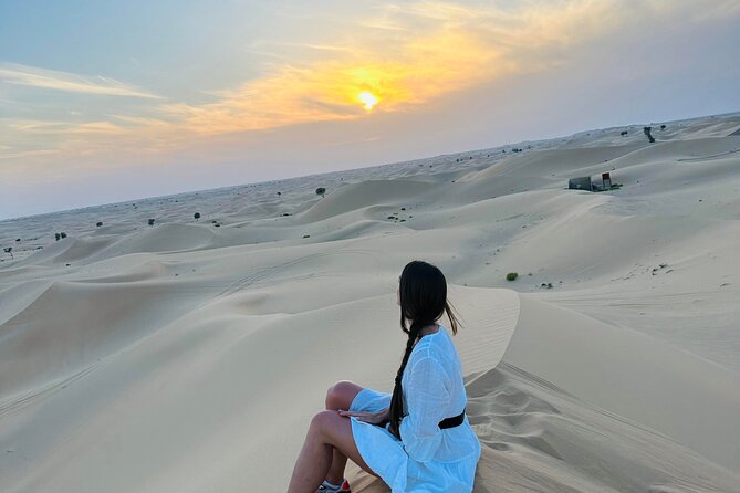 Abu Dhabi: Evening Desert Safari with Camel Ride, BBQ & Live Show - BBQ dinner, tea, and two live performances