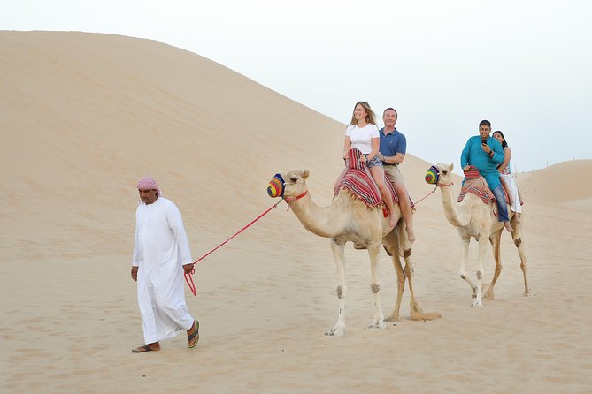 Abu Dhabi Half Day Desert Safari - Sunset, sandboarding, and the desert photo stop