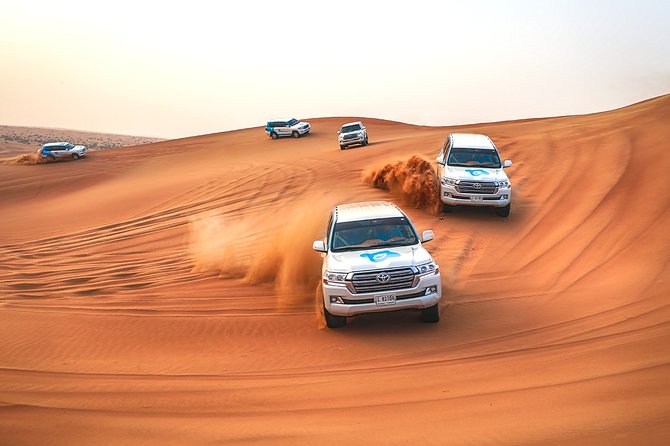 Abu Dhabi: Morning Desert Safari with Camels and Sandboarding - Sandboarding on the Abu Dhabi dunes