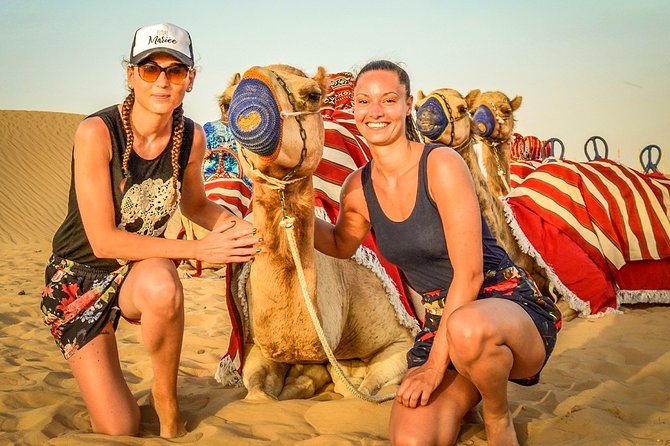 Abu Dhabi: Morning Desert Safari with Camels and Sandboarding - The first desert stop: tires, photos, and a change of scenery