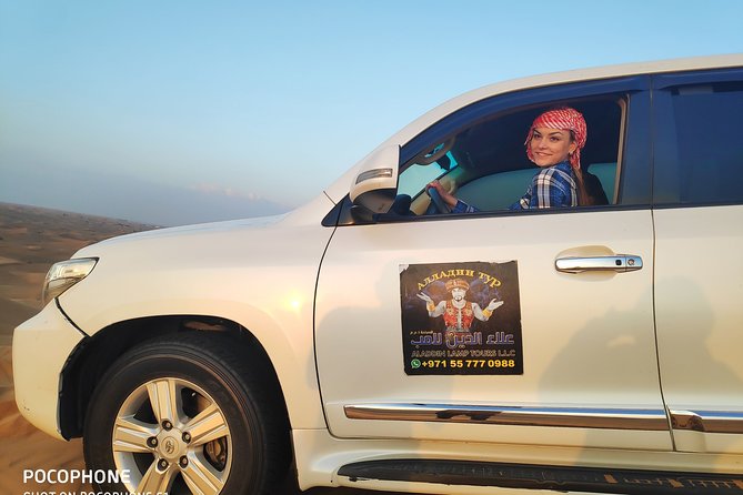 Afternoon Dune Drive Safari with SunSet Photo & Sand Boarding - Sunset photos and camel encounters