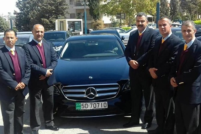 Airport pickup or drop off transfer from or to Amman city - The name board makes a tired arrival easier