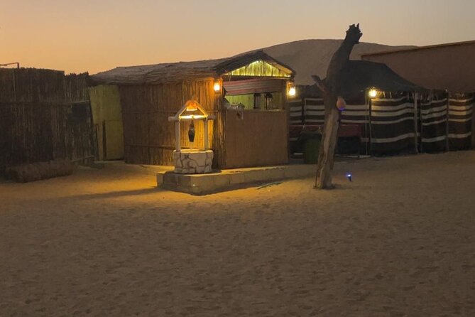 Al Ain Desert Safari with Buffet Dinner - The fort-style camp after sunset