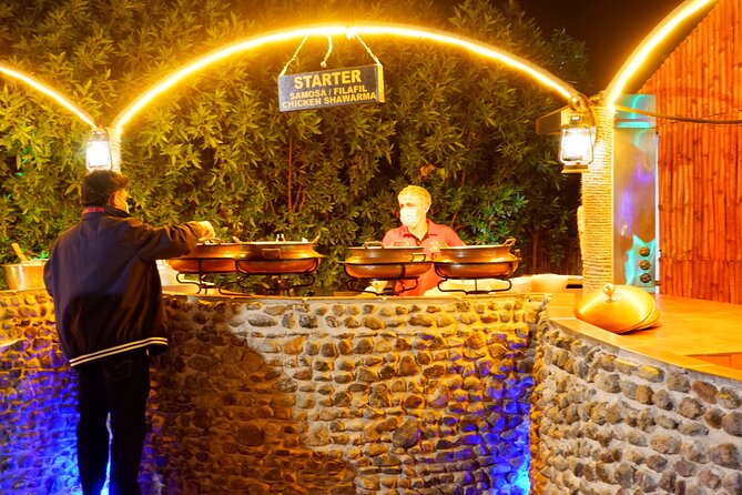 Al Madam Red Sand Safari with BBQ Dinner & Traditional Show - BBQ dinner and a busy camp evening