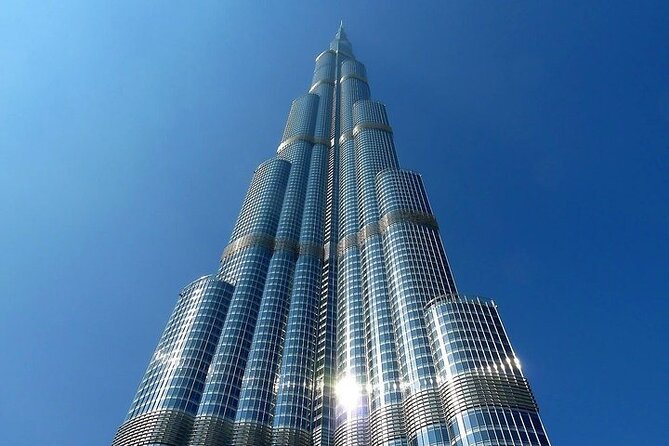 At the top burj khalifa dubai ticket with cafe treat - The lift ride and Burj Khalifa story