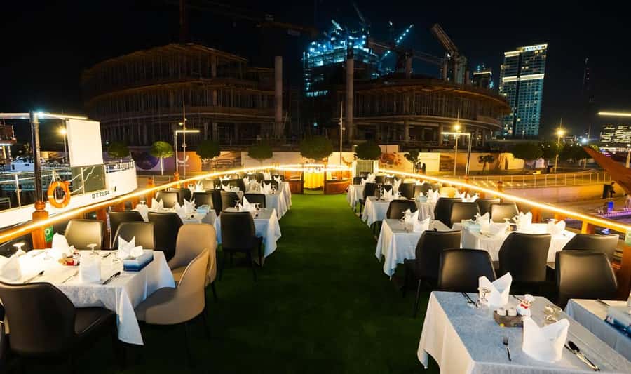 Best 5-Star Dhow Dinner Cruise Dubai Marina Jack Sparrow - A traditional dhow with a modern Dubai backdrop