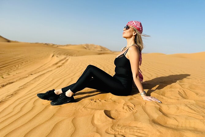 Best Dubai Desert Safari with Buffet Dinner,Sand Boarding & Shows - Dinner, tanoura, belly dance, and fire