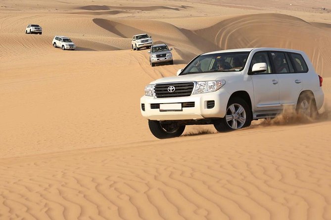 Best Dubai Desert Safari with Buffet Dinner,Sand Boarding & Shows - What the shared format means