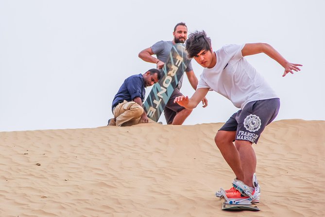 Classic Dubai Desert Safari with BBQ Dinner and Camp activities - Clothing, heat, and physical effort