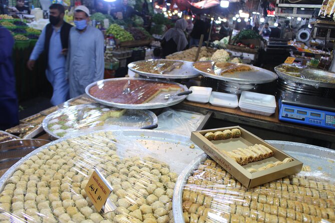 Day or Night Walking Tour in Downtown With Local - Basman Street and the market route