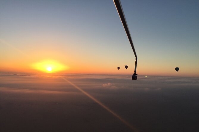 Deluxe Hot Air Balloon Ride with Breakfast & Flight Falcon Show - Breakfast and a short camel ride at the camp