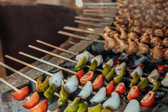 Deluxe Sunset Desert Safari: SandSurfing, Camel Ride & BBQ dinner - What the $68.60 price really covers