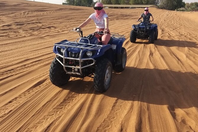 Desert Quad Safari Tour with Sandboarding and Picturestopps - Key points at a glance