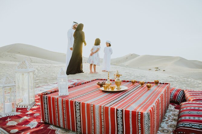 Desert Safari Abu Dhabi w/ Sand Boarding, Camel Ride & BBQ Dinner - The Bedouin-style camp after sunset