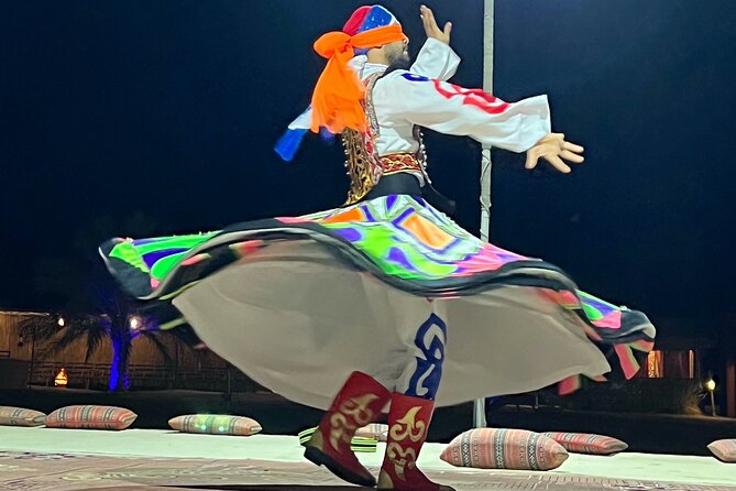 Desert Safari Abu Dhabi w/ Sand Boarding, Camel Ride & BBQ Dinner - Belly dancing, tanoura, and the evening show