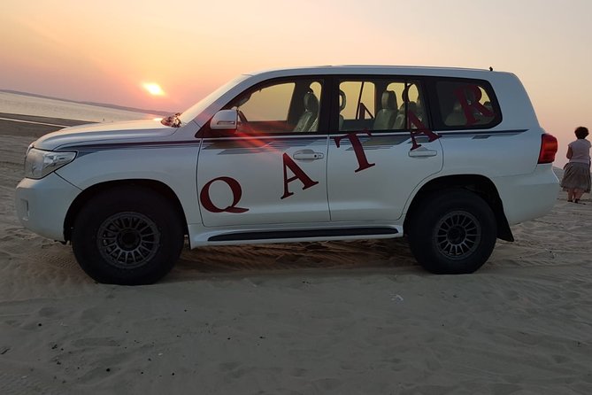 Desert Safari Adventure 4 hours from Doha with Pickup - Adding camels, falcons, and quad bikes