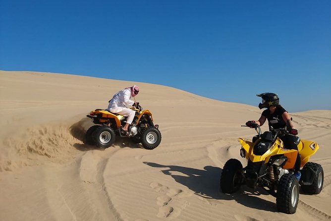 Desert Safari Adventure 4 hours from Doha with Pickup - Sandboarding on the dunes