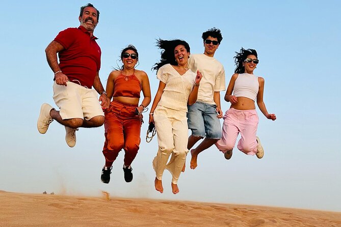 Desert Safari Adventure Dubai - Camel rides, sandboarding, and desert photographs