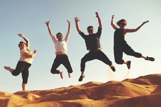 Desert Safari and Quad Bike Experience in Dubai with Dinner - Sandboarding and the short camel ride