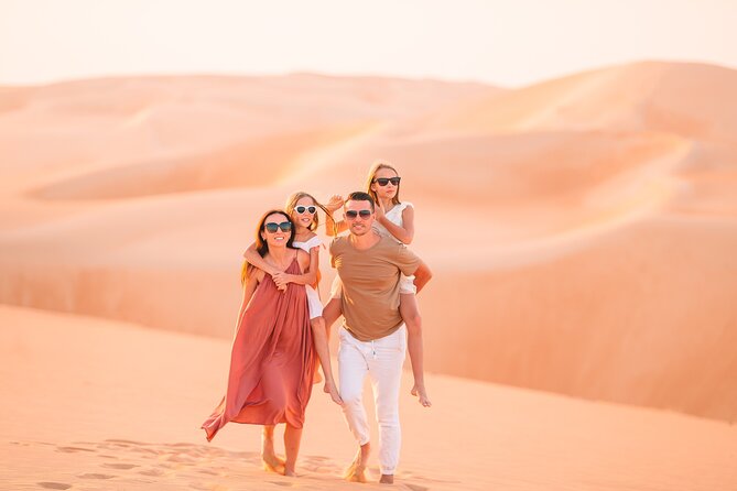 Desert Safari BBQ dinner, Camel ride & sandboarding from Dubai - Henna, Arabic clothing, and photos at the camp