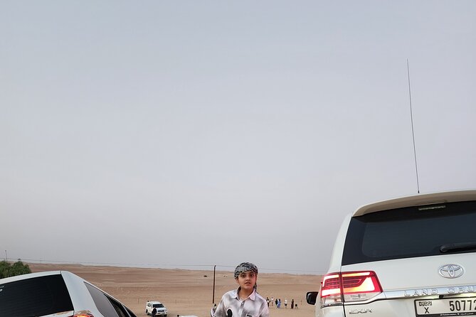 Desert Safari BBQ Dinner, Live Shows, ATV Bikes, Sandboarding - Dune bashing with Abdul, Ali, and Manssour