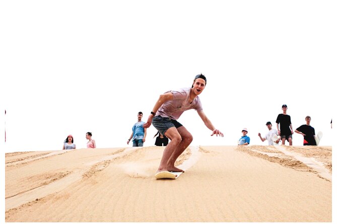 Desert Safari Combo: Camel Ride, Sandboarding & Inland Sea Visit - One hour of dune bashing in the Mesaieed desert