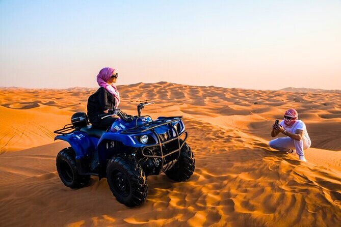 Desert Safari Dubai 30 Mins Quad Bike, Sand Board, Camel Ride BBQ - Dune bashing across the red desert