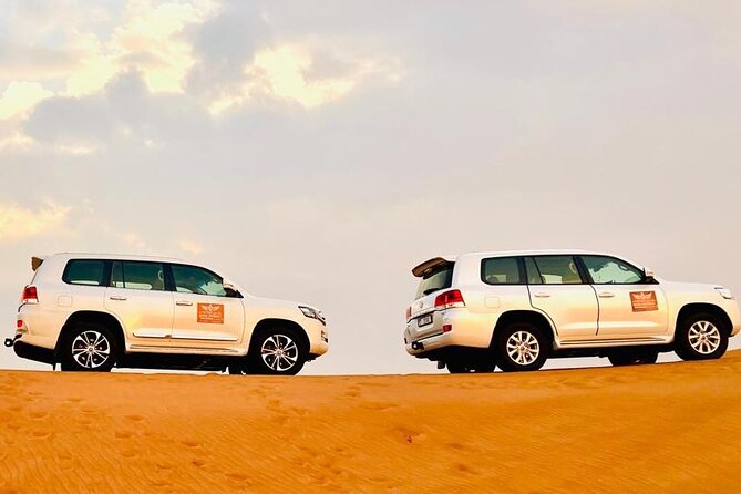 Desert Safari Dubai with BBQ Dinner & Camel Ride - Sandboarding on soft rolling dunes