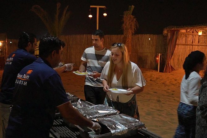 Desert Safari in 4X4 through Lahbab Desert with BBQ Dinner - BBQ dinner and live entertainment